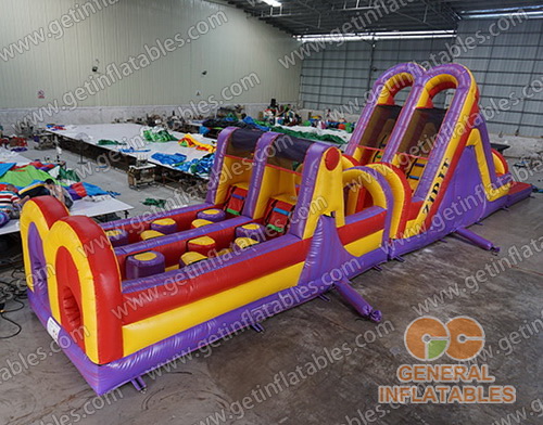 Purple dual lane obstacle course with pool